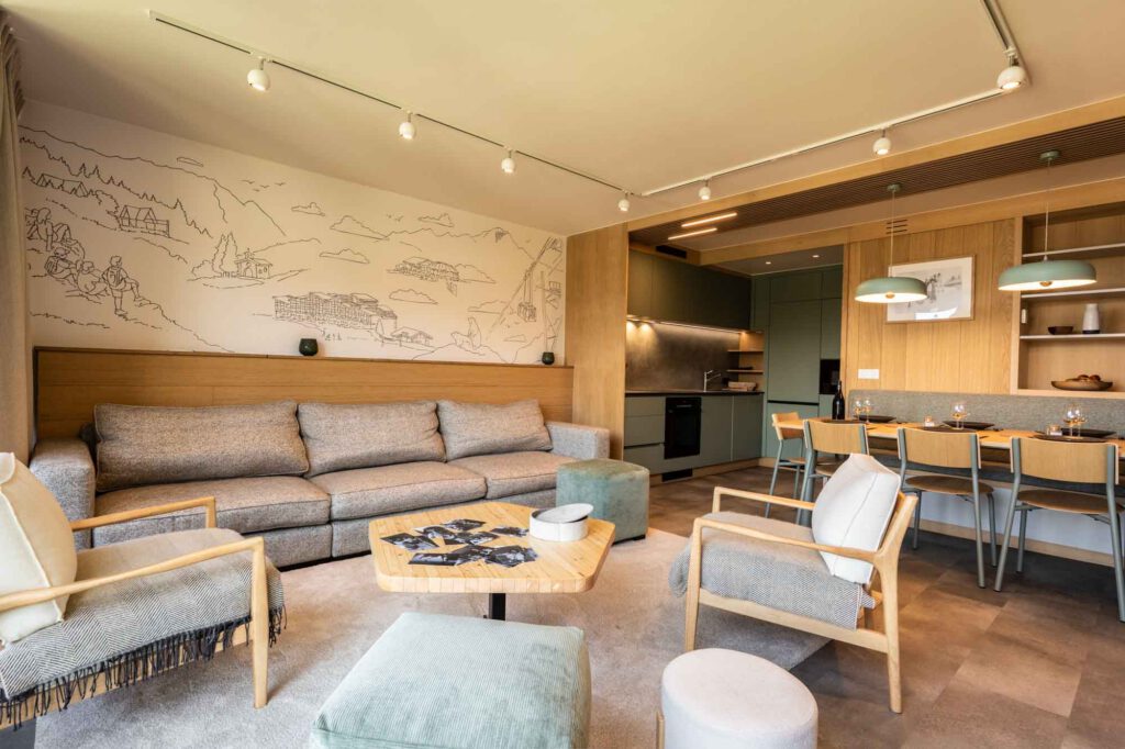 living et salle à manger, ambiance moderne et cosy, lumineuse dans un chalet de montagne